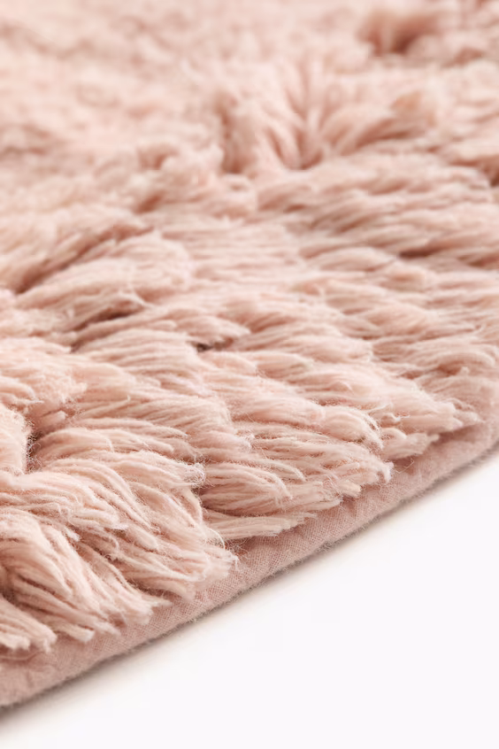 Овальный ковер для ванной комнаты