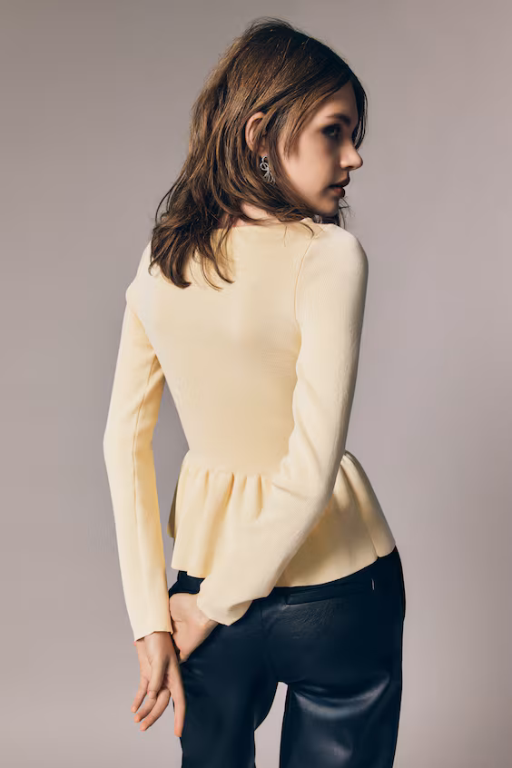 Джемпер пеплум из трикотажа