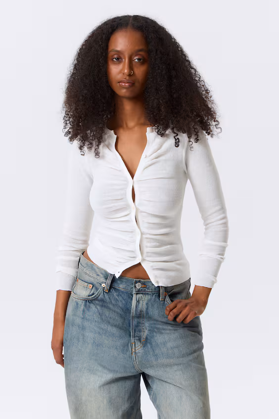 Кардиган с пуговицами и защипами