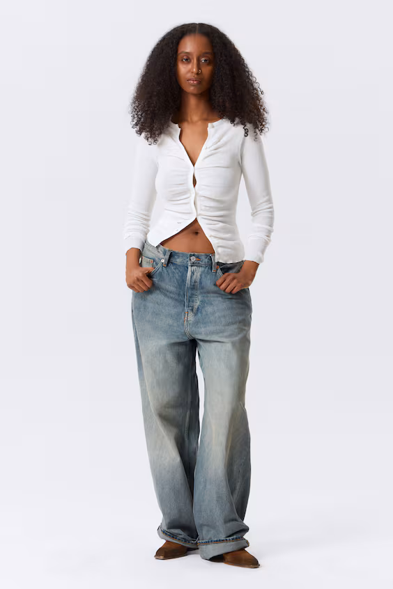 Кардиган с пуговицами и защипами