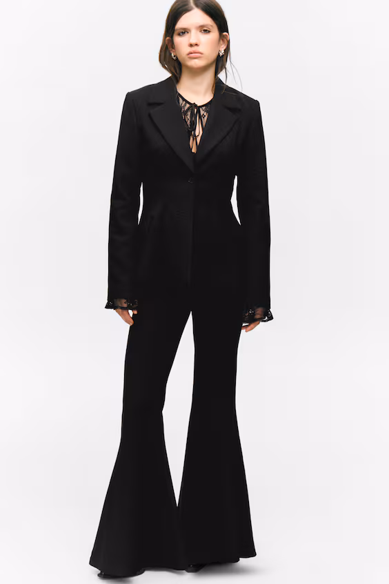 Брюки с низкой талией и расклешенным низом