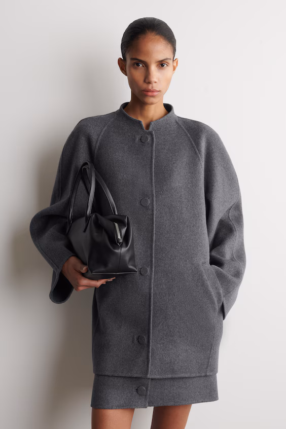 Двусторонний пальто из шерсти с закругленными краями