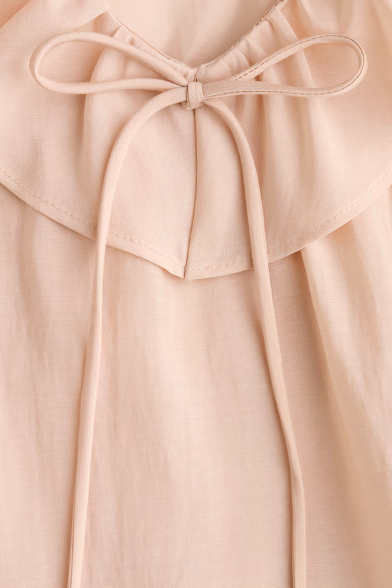 Блуза с оборками