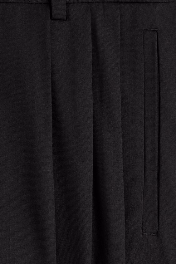 Широкие шерстяные брюки со складками