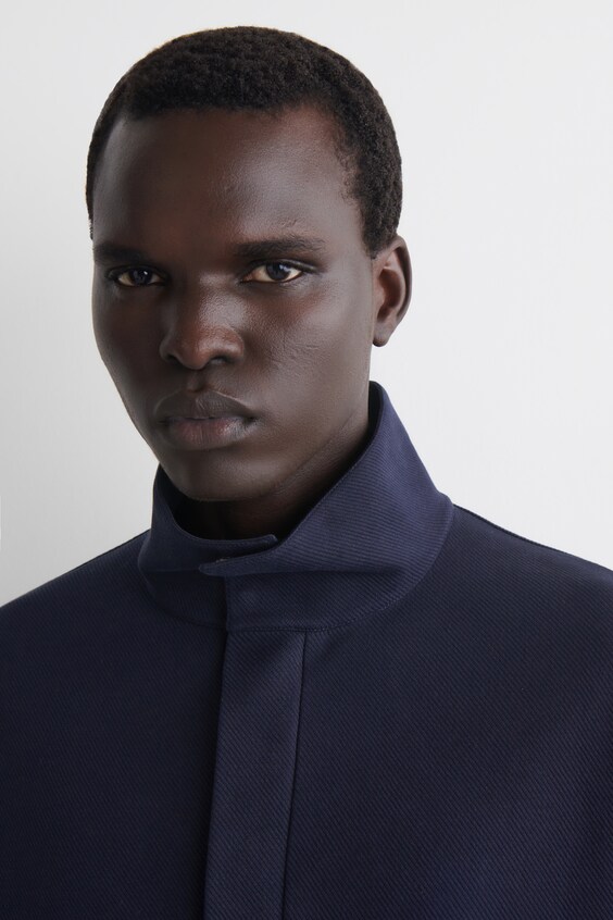 Свитер с молнией и высоким воротником-стойкой