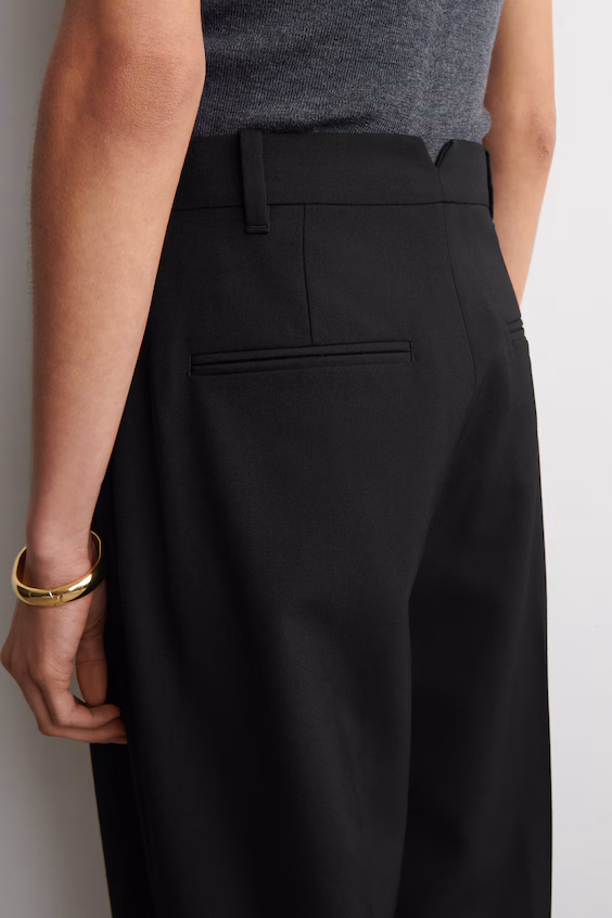 Брюки-клеш из шерсти со складками