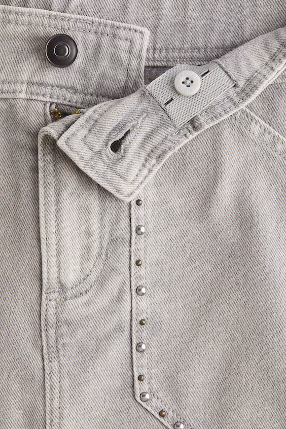 Джинсовая юбка с заклепками