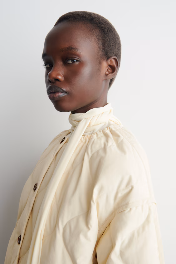 Пуховой жилет с складками