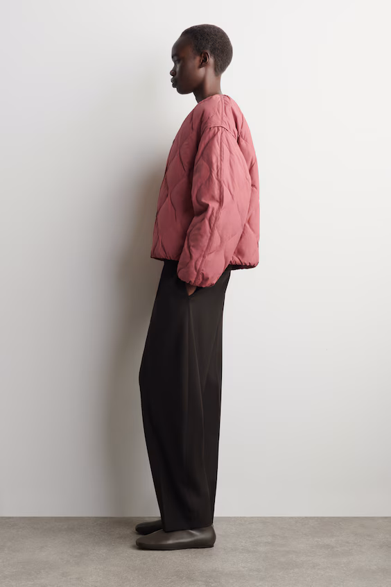 Пуховой жилет с складками