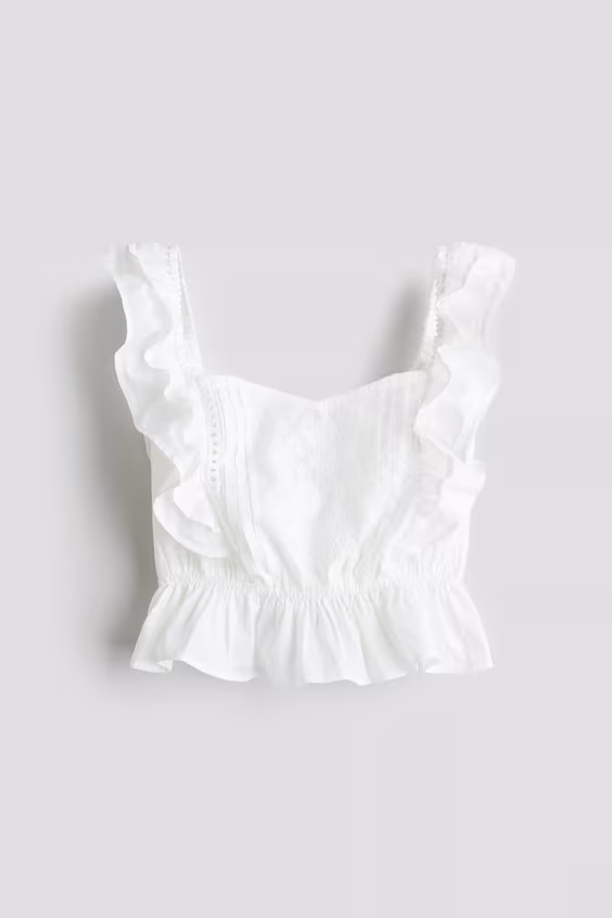 Топ из хлопка с рюшами на рукавах