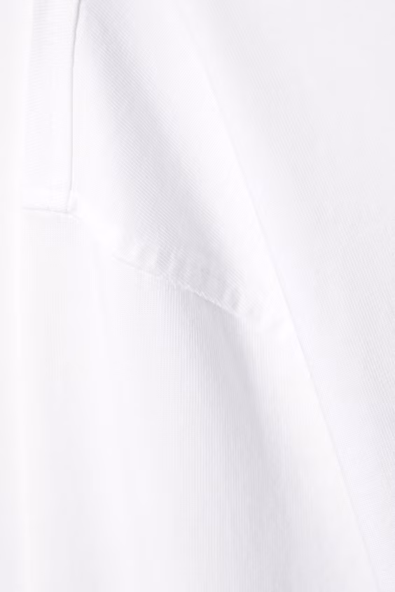 Свитер с длинными рукавами свободного кроя