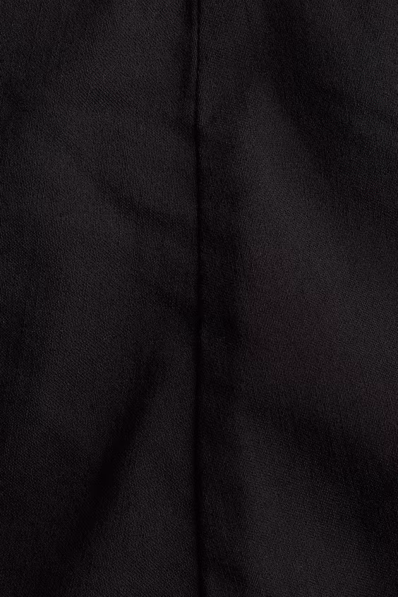 Брюки с молниями на штанине