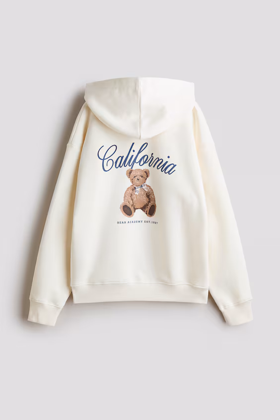 Пальто с капюшоном и вышитым узором