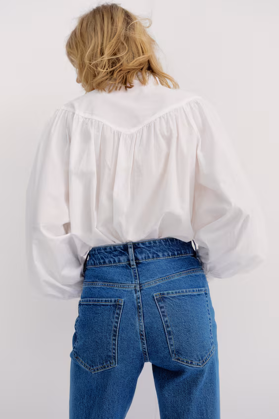 Расклешенные джинсы с высокой талией