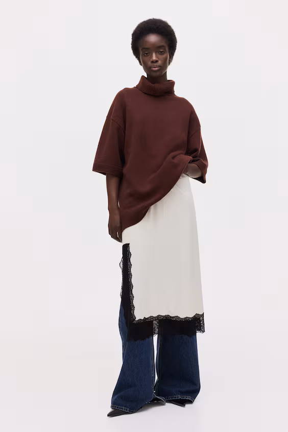 Вязаный свитер с высоким воротником