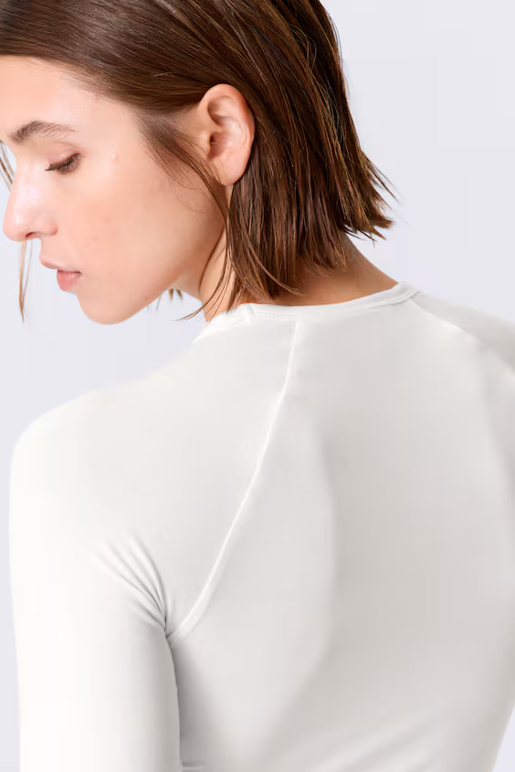 Облегающий топ с реглановыми рукавами