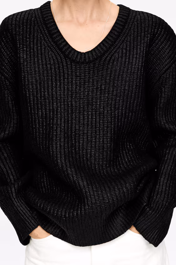 Покрытый шерстью свитер