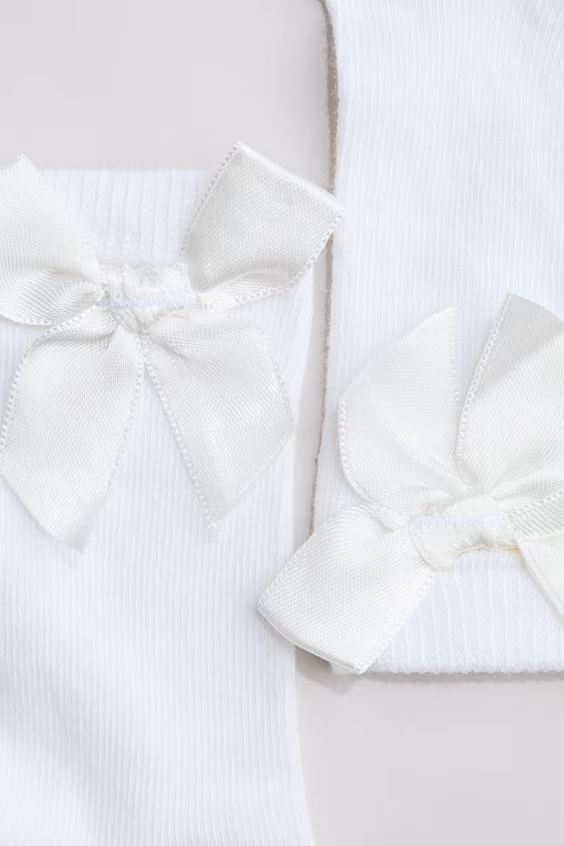 Носки до колена с декоративным бантом