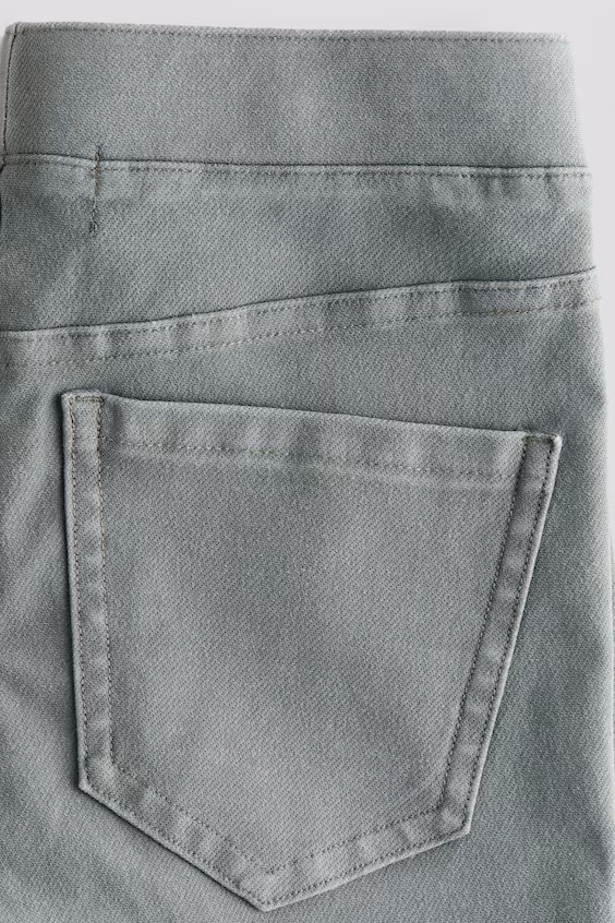 Джеггинсы-клеш с эффектом джинсы