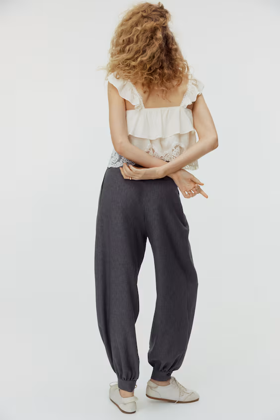 Брюки с запахом и складками