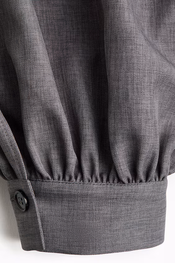 Брюки с запахом и складками