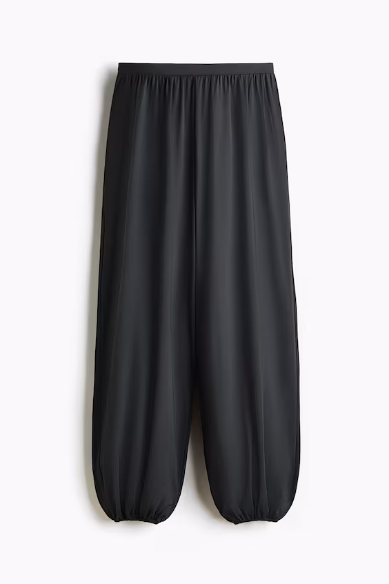 Брюки с защипами