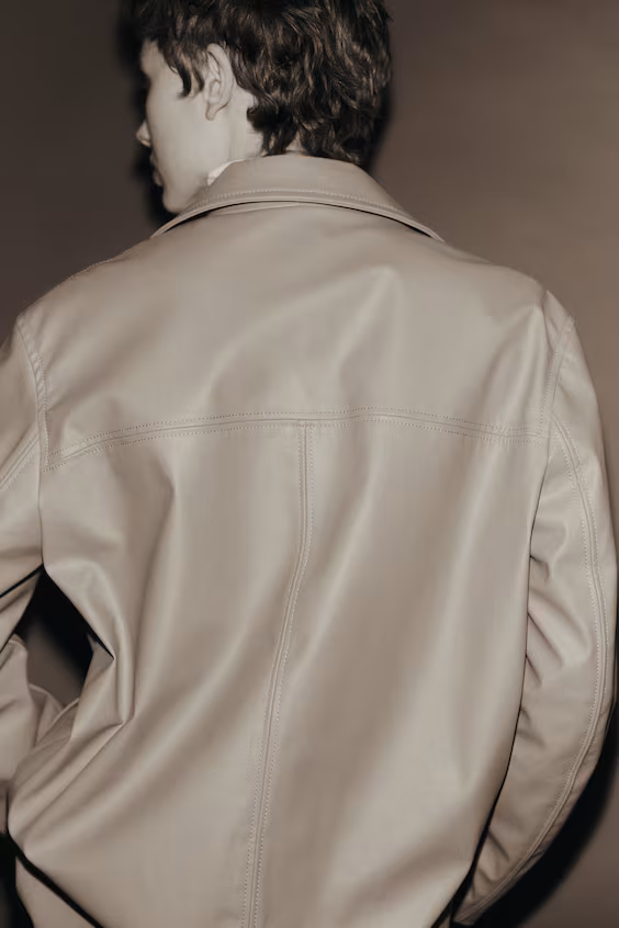 Пальто из ткани с покрытием