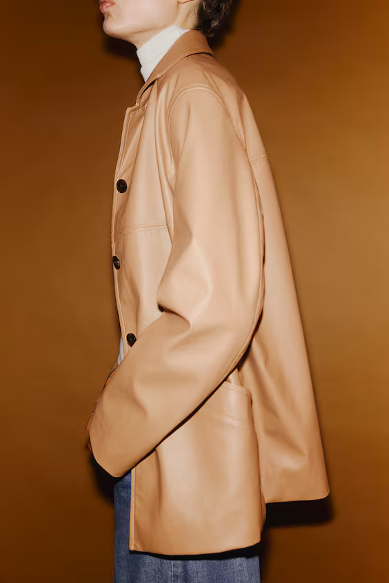 Пальто из ткани с покрытием