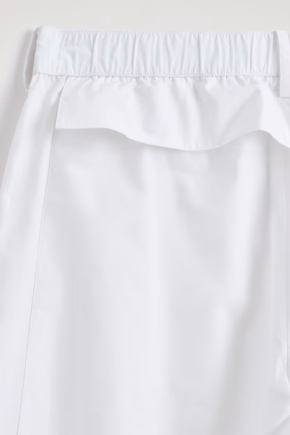 Брюки из хлопка с вставками и складками