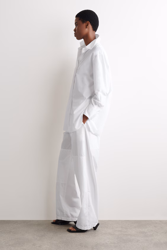 Брюки из хлопка с вставками и складками