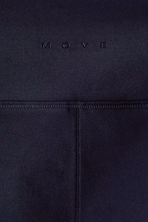 Спортивные лосины с расклешенным низом и технологией softmove™