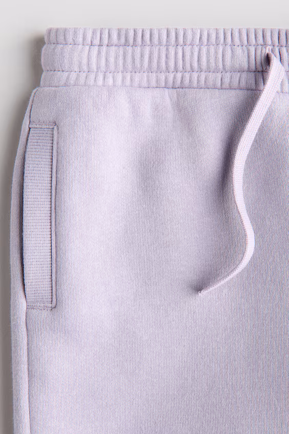 Длинные брюки в стиле джоггеры с начесом