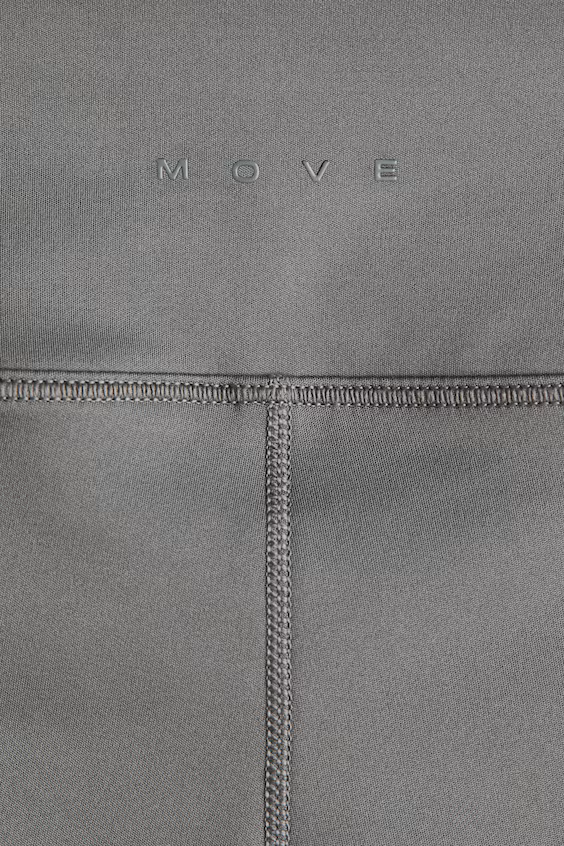 Леггинсы для спорта с расклешенным низом на широкой резинке с технологией drymove™