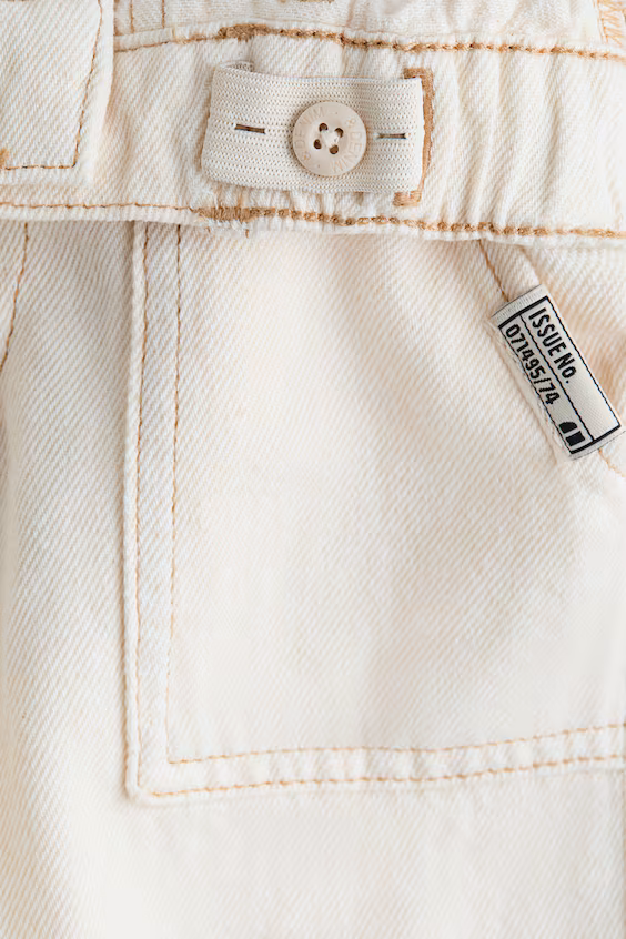 Джинсы свободного кроя с зауженными штанинами