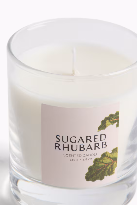 Восковая ароматическая свеча в стеклянном контейнере