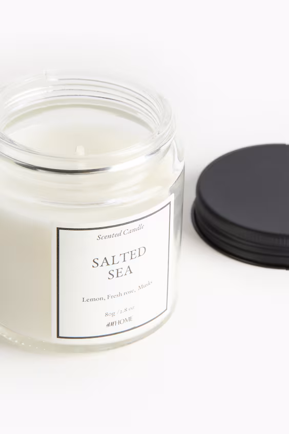 Восковая ароматическая свеча в стеклянном контейнере