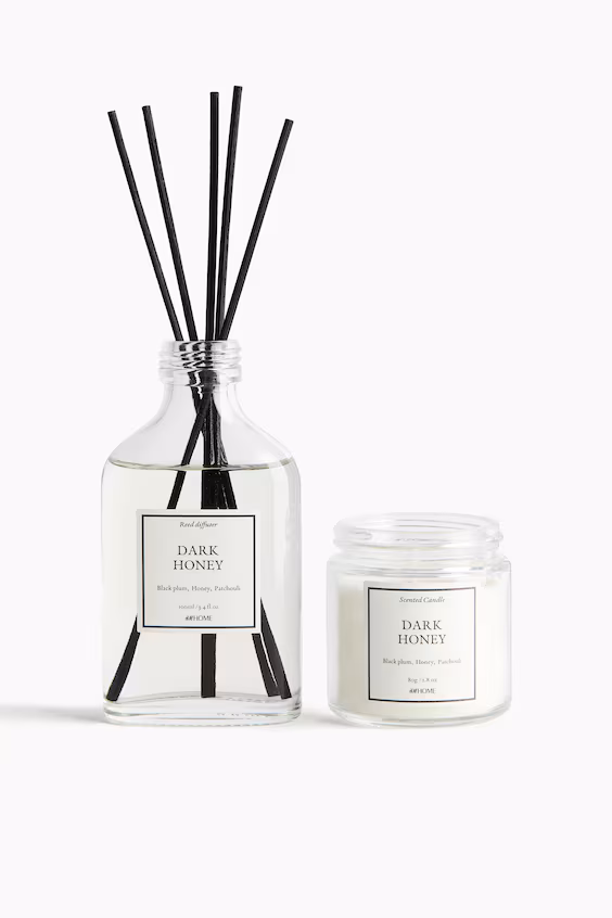 Восковая ароматическая свеча в стеклянном контейнере