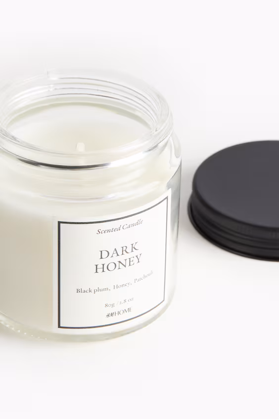 Восковая ароматическая свеча в стеклянном контейнере