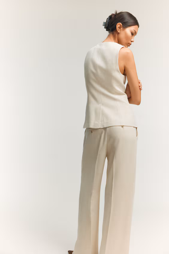 Длинный жилет