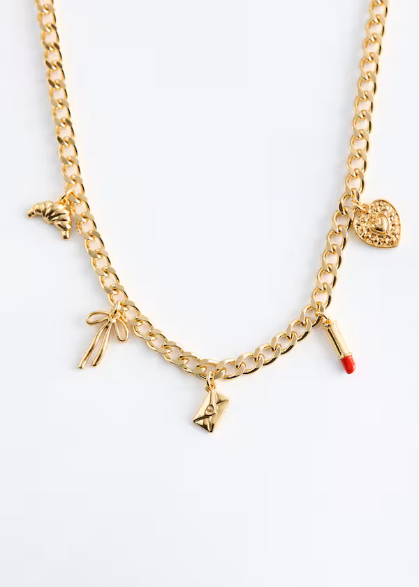 Украшенное цепью колье