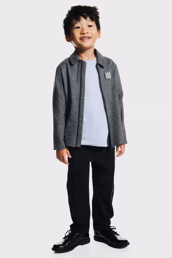 Брюки с защипами