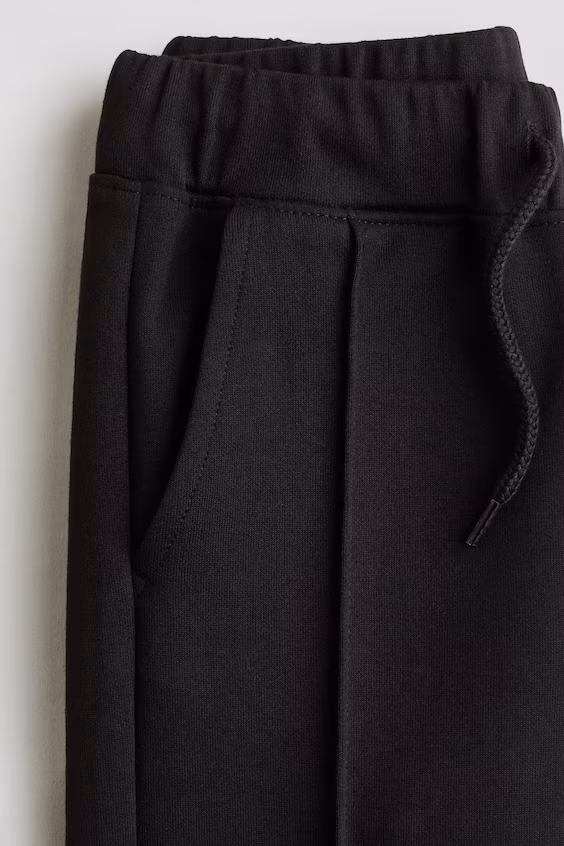 Брюки с защипами