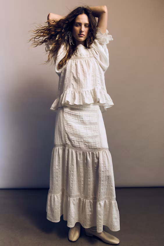 Блузка с воланами на рукавах