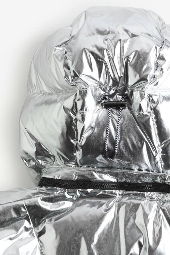 Жилет из перьев, отталкивающий воду