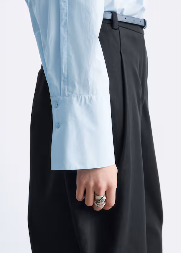 Топ с воротником-стойкой и рюшами