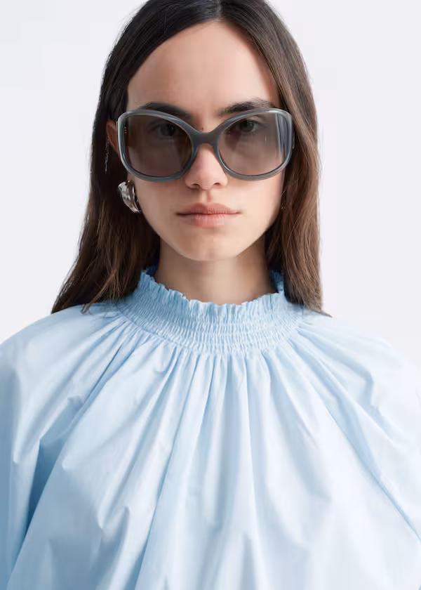 Топ с воротником-стойкой и рюшами