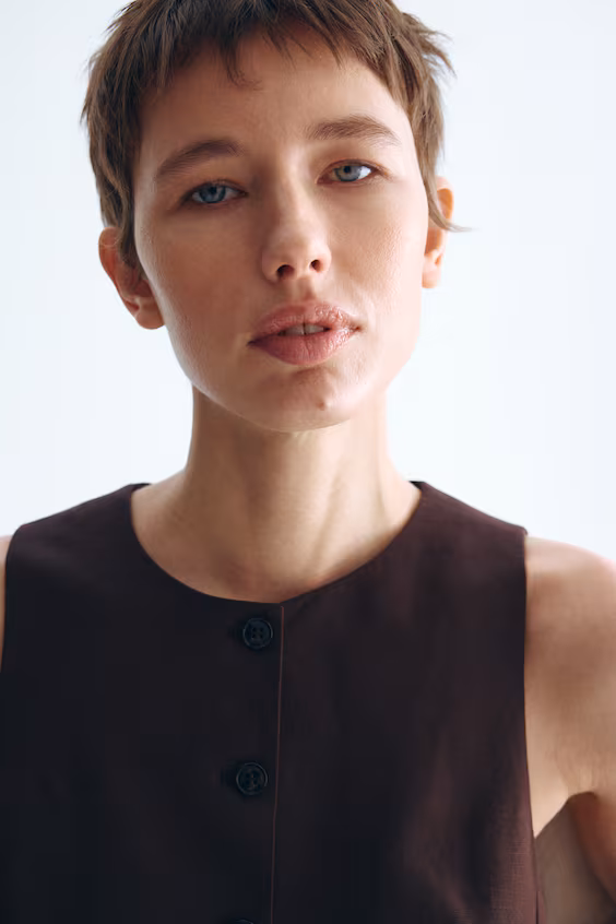 Длинный жилет