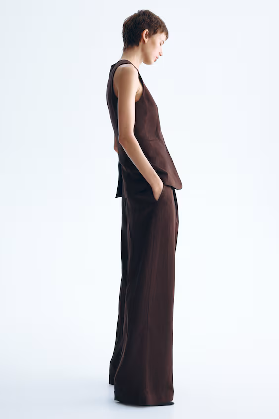 Длинный жилет