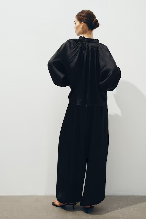 Брюки с волнистыми краями