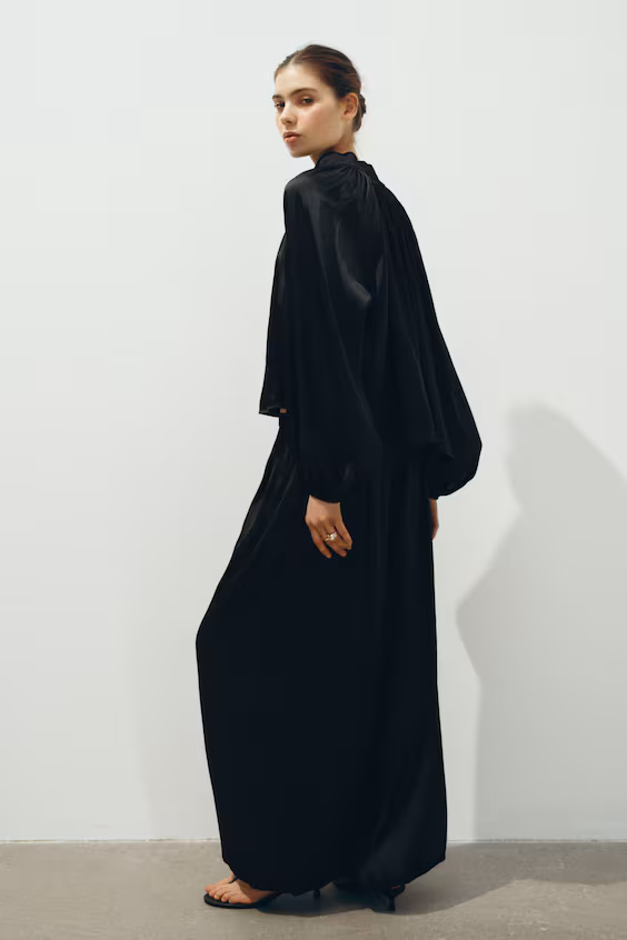 Брюки с волнистыми краями